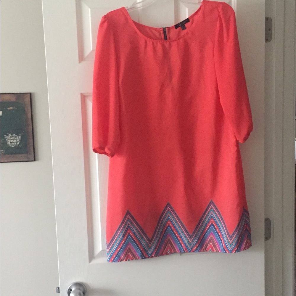 Coral dress with chevron detail